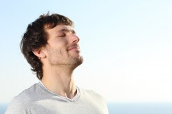 Close Up Of A Man Doing Breath Exercises Outdoor