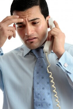 Stressed  depressed man businessman on phone